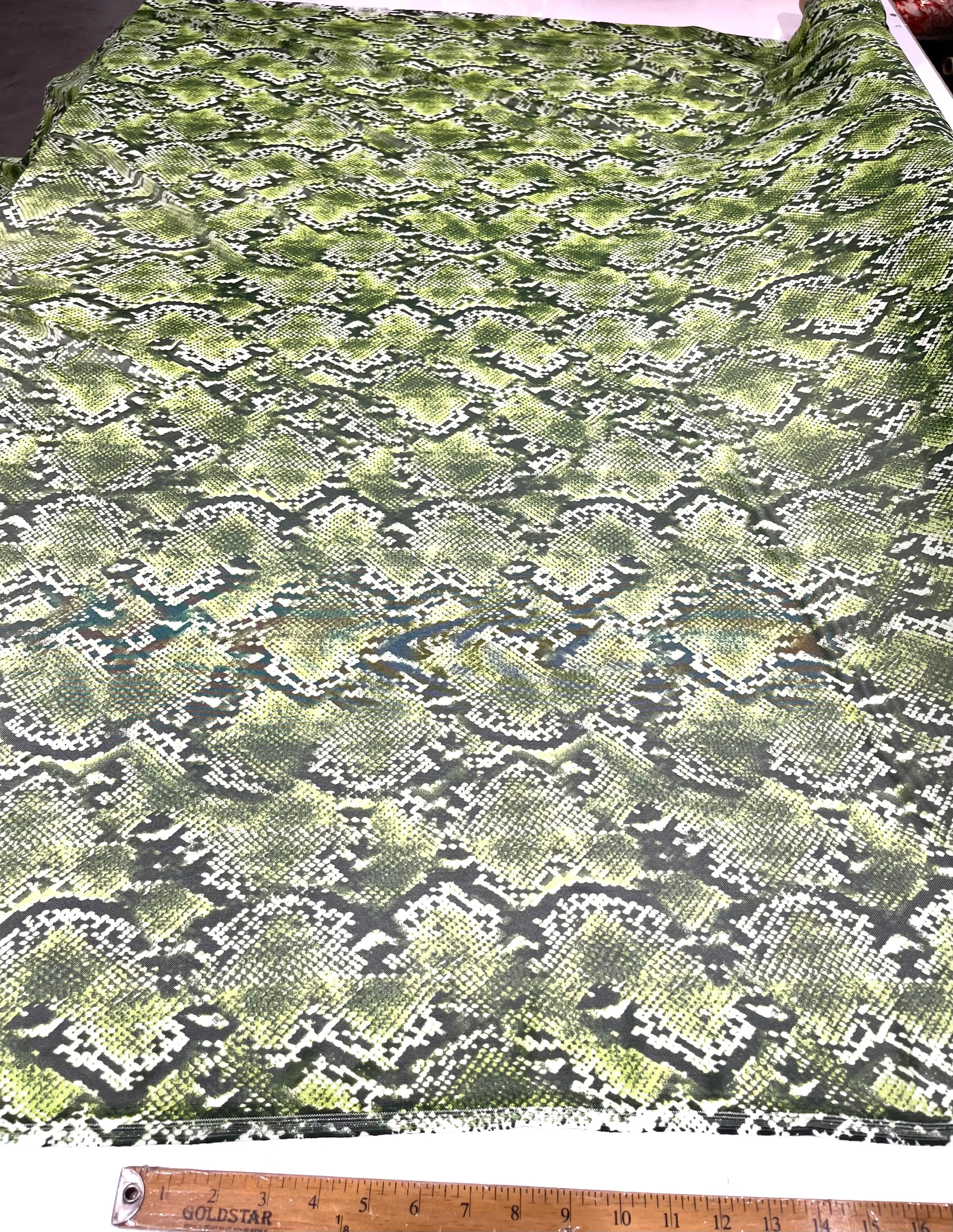 Green/ Black snake design on a power mesh 4-way stretch 58"-Sold by the yard.