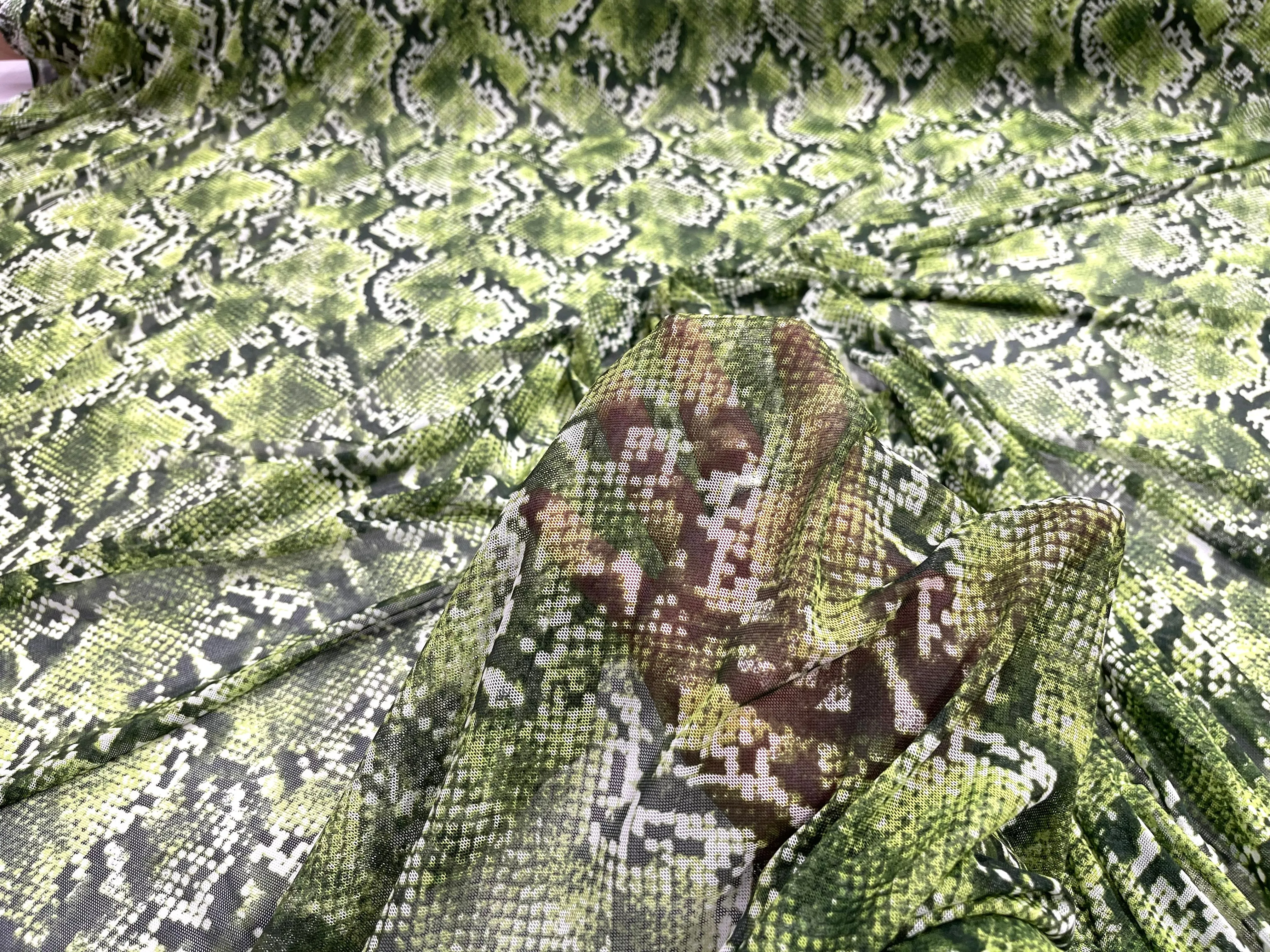 Green/ Black snake design on a power mesh 4-way stretch 58"-Sold by the yard.
