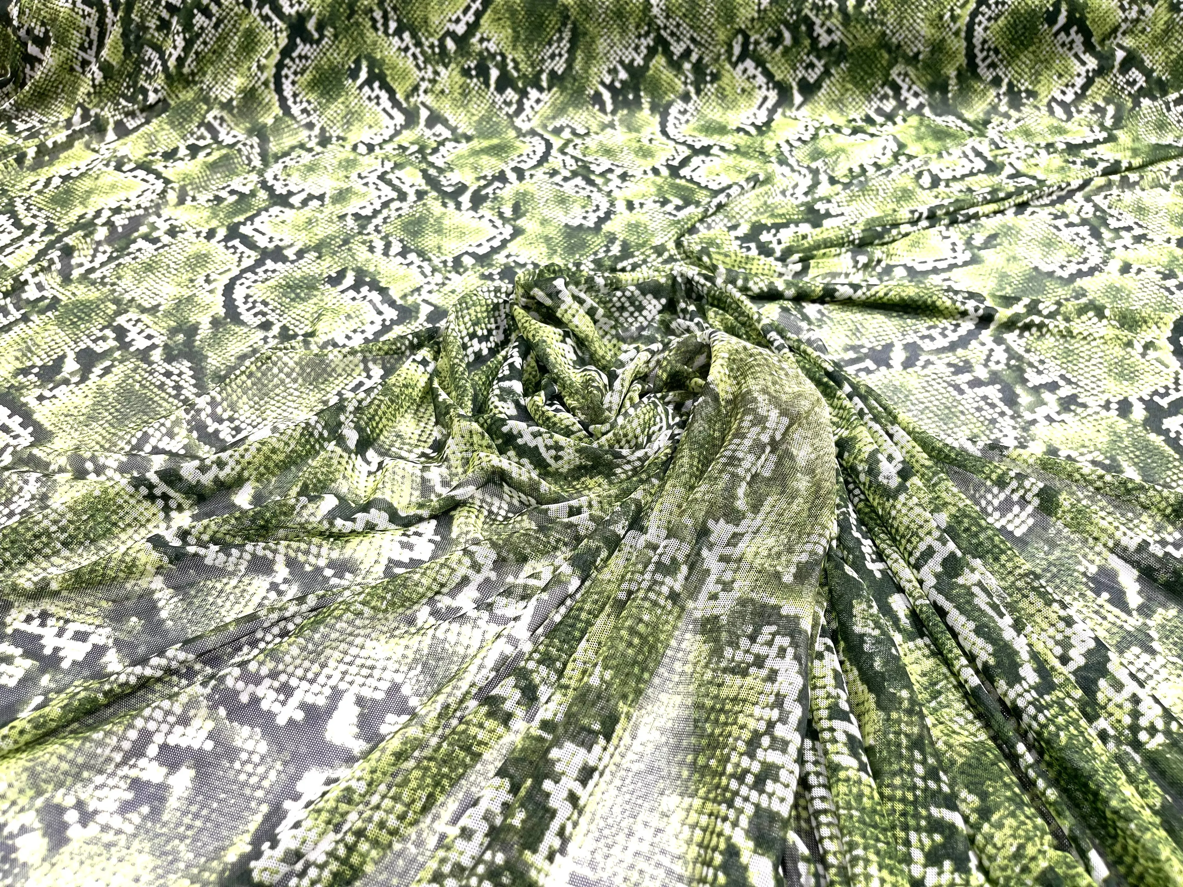 Green/ Black snake design on a power mesh 4-way stretch 58"-Sold by the yard.
