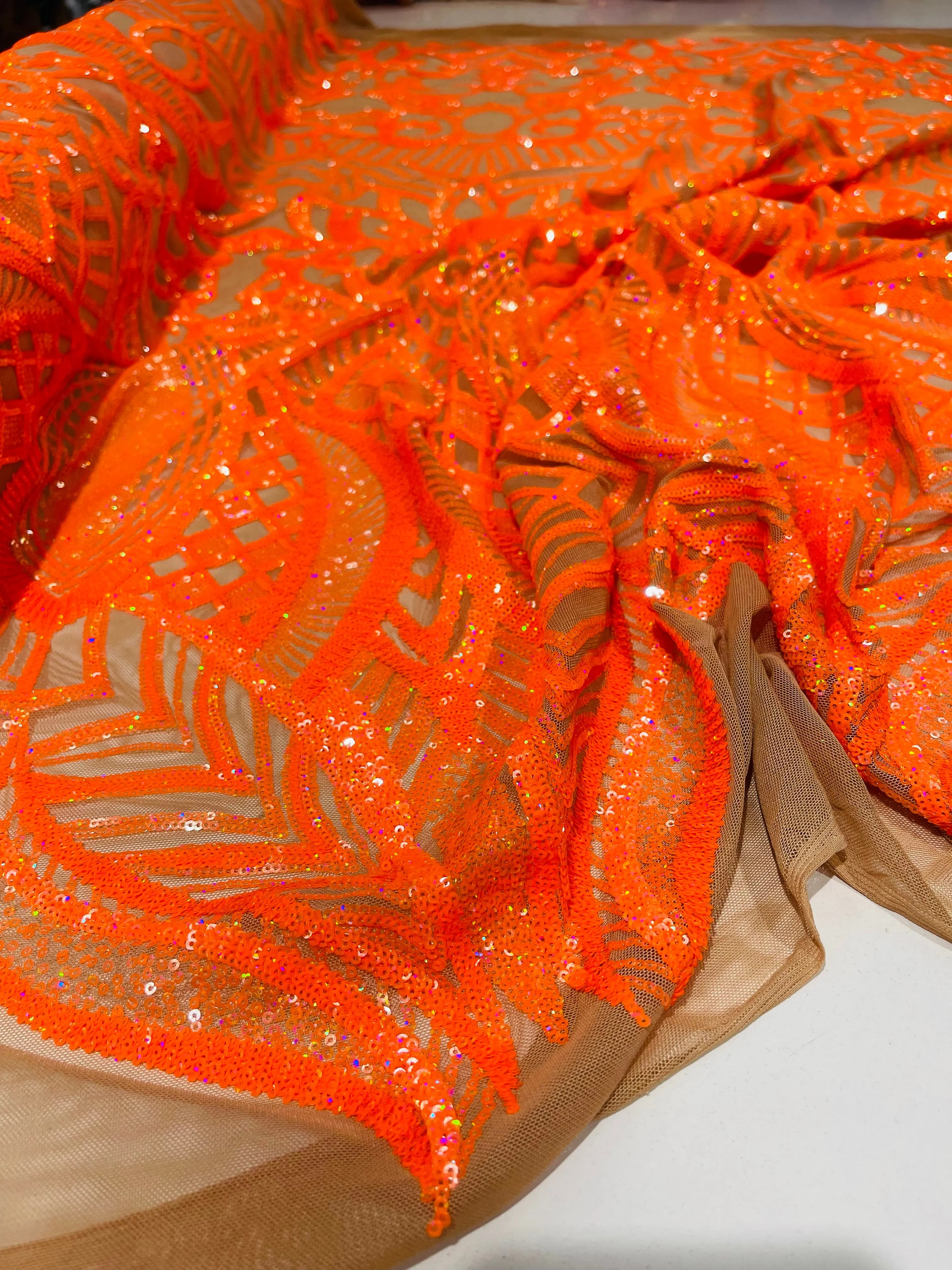 Neon Orange iridescent royalty design on a skin 4 way stretch mesh-prom-sold by the yard.