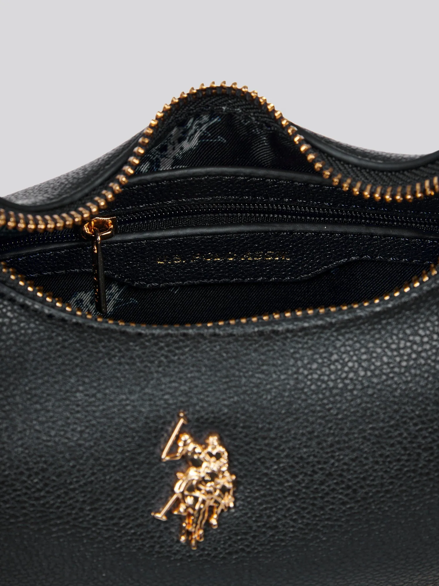 U.S. Polo Assn. Womens Jones Small Round Hobo Bag in Black